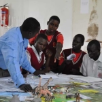 Small group reviews a map