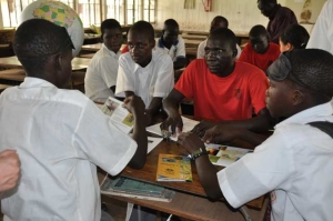 Small group studies the warthog