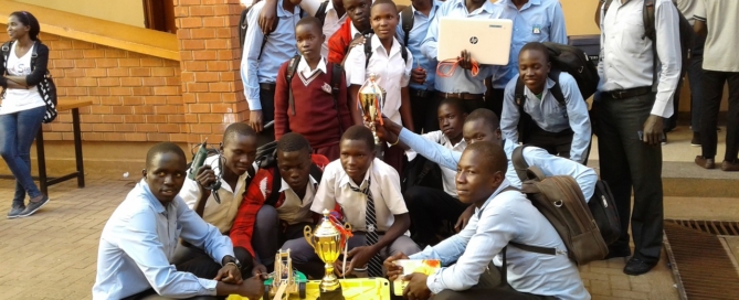 Students of Gulu High School and Negri College pose for a photo