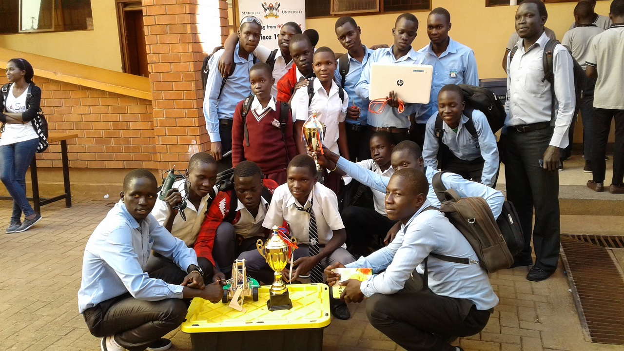 Students of Gulu High School and Negri College pose for a photo