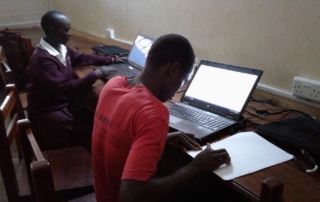 Blind students studying in Gulu High School Computer Lab