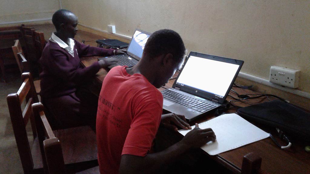 Blind students studying in Gulu High School Computer Lab