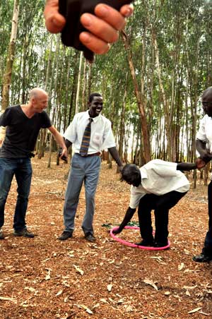 Passing the hulu hoop without breaking hand-holds