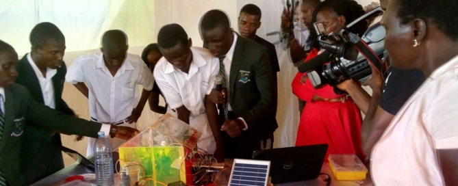 Students of Kiira College Butiiki demonstrate how the Smart Farm works.